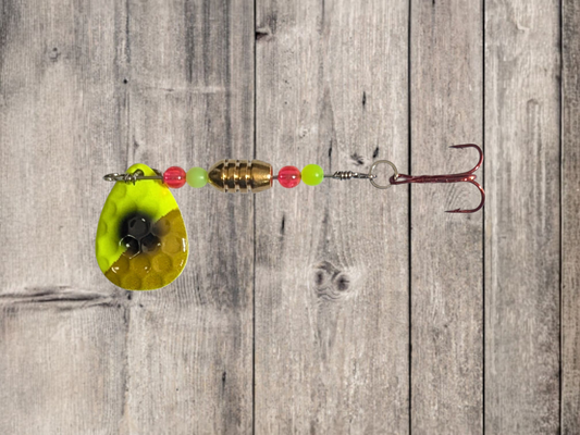 Custom handmade quality fishing spinners.  Brass body with red and green beads. Chartreuse and brown spinner with black dot.